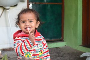 a kid brushing
